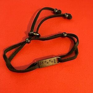 Two Blind Brothers Feel bracelet.  FEEL in braille. Leather adjustable band